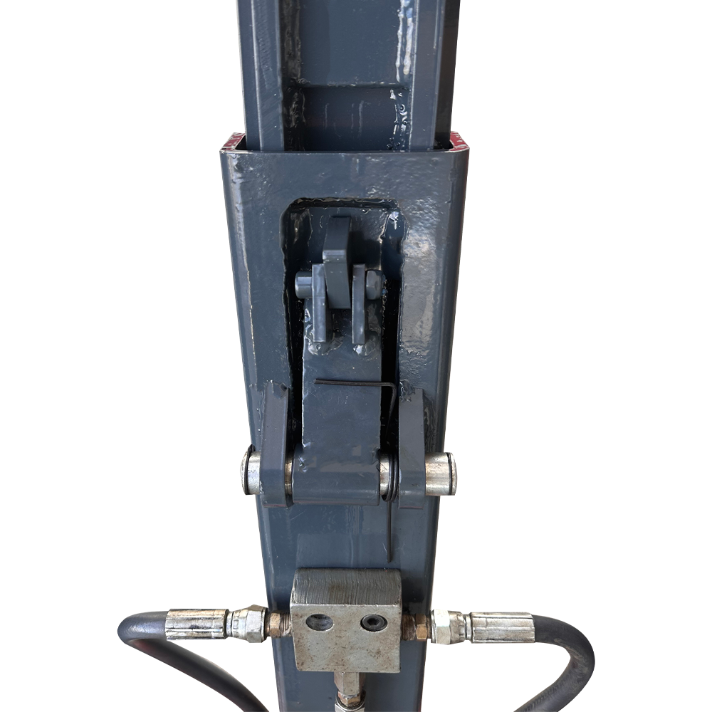 Close-up of a mechanical component with metal parts and hoses on a white background