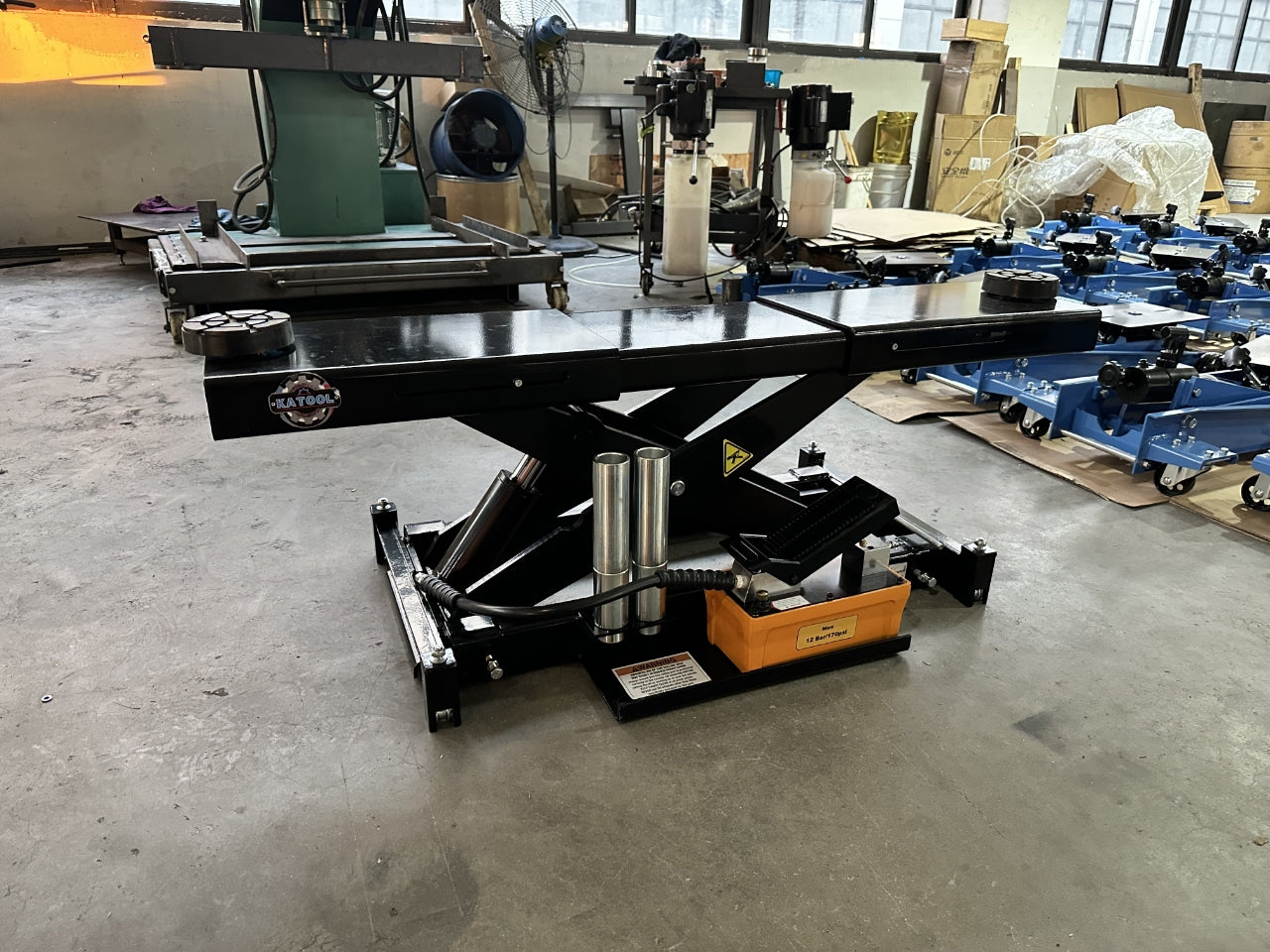 KATOOL KT-RJ70 7000lbs Rolling Jack in warehouse